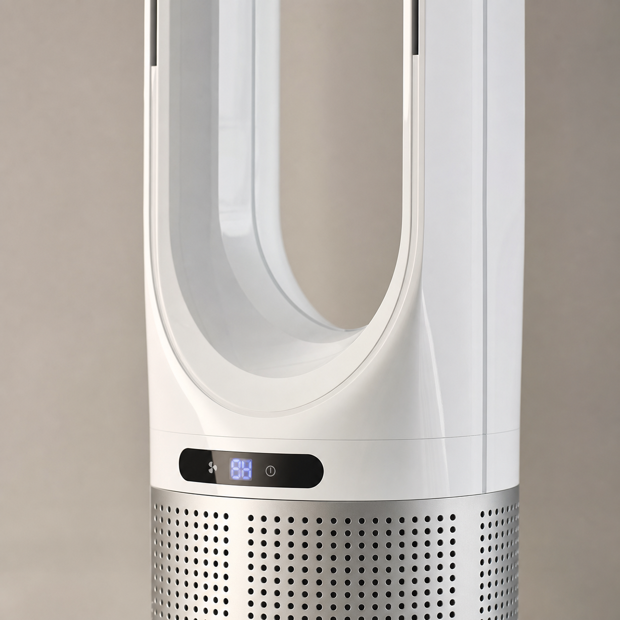 Close-up of the Aura circular display and silver perforated purifier intake