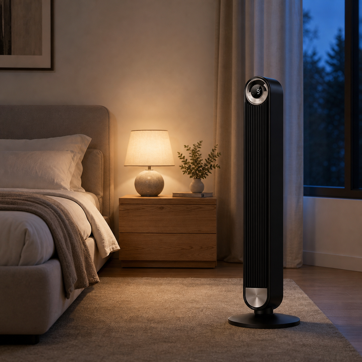 VALO Lumen 42 black and silver tower fan in a warm modern bedroom